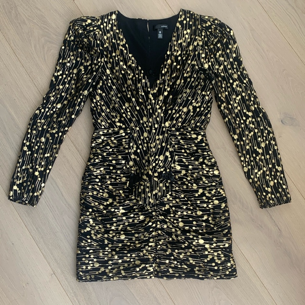 Aqua brand dress in gold and black. Size small.